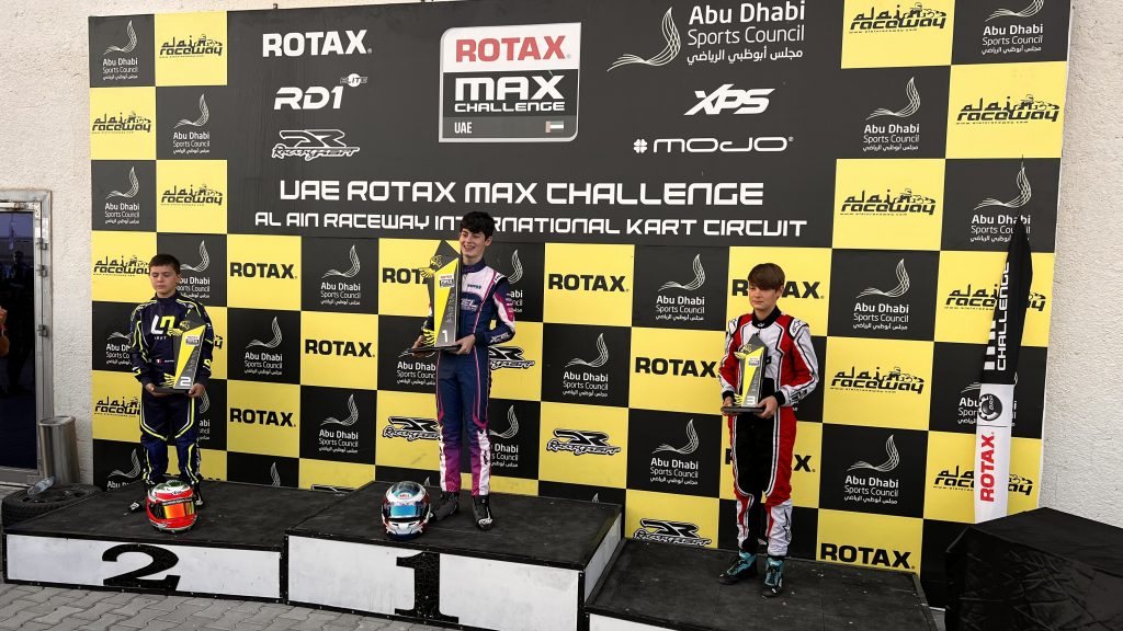 HARRY HANNAM ON THE RMC UAE PODIUM 2021-2022.